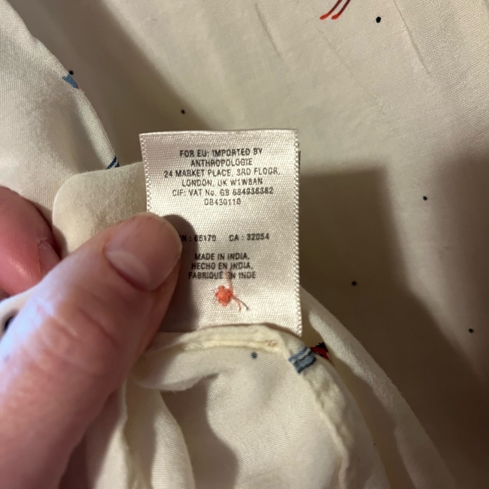 Maeve White Shirt with Red and Blue Skiers - Picture 14 of 15